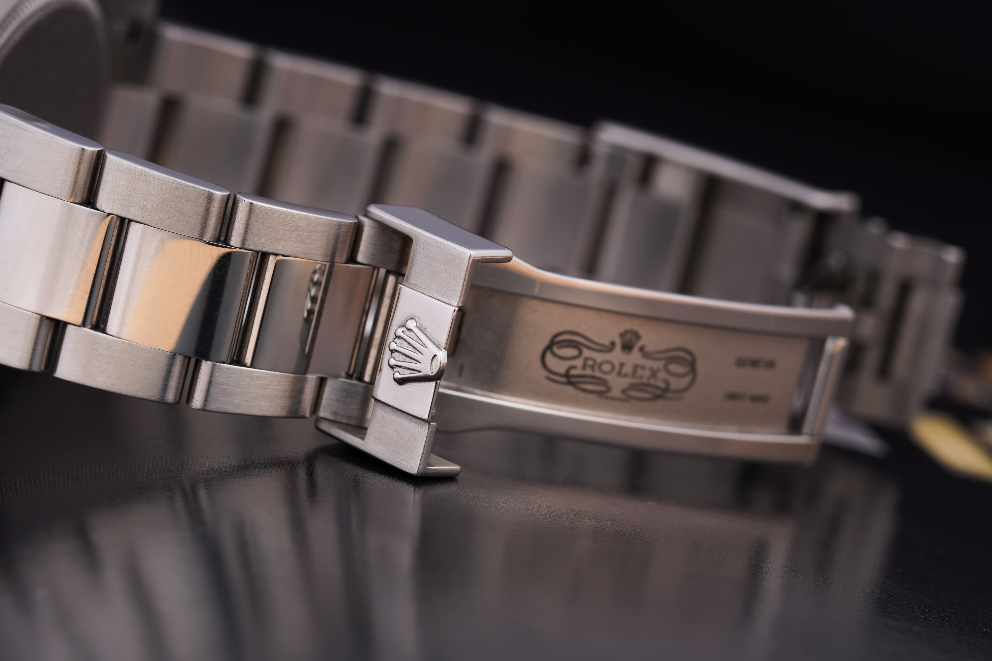 Macro detail of a Rolex watch bracelet and clasp